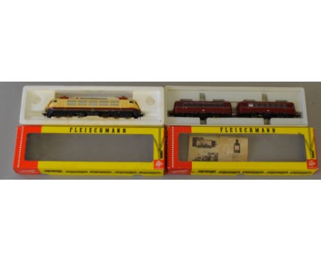 H0 scale. 2 x Fleischmann locomotives. 4400 twin railbus DB red & 4375 pantograph electric DB cream / red. VG in G boxes.