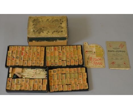 1924 Chad Valley Mah-Jongg game. Contains Ivory pieces and wooden tiles. Also includes the Ninth Edition Rulebook and the "Ch