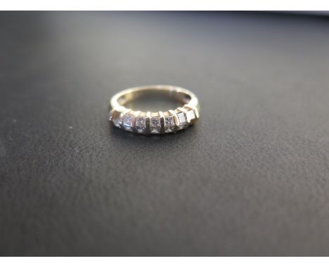 A princess-cut diamond two-row dress ring - Stamped 14K - Ring size H - Weight approx 2.4gms
Condition Report: Fair - With li