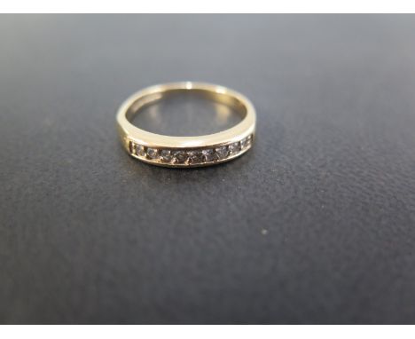 A 9ct gold diamond half-circle ring - Hallmarked Birmingham - Ring size M - Weight approx 2.1gms
Condition Report: Good