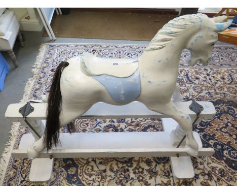 A vintage white and blue painted wooden rocking horse - 130cm x 55cm wide x 106cm high - in good condition, recently repainte