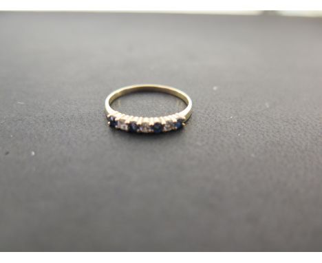 A sapphire and diamond seven-stone ring - Stamped 14k - Ring size M 1/2 - Weight approx 1.4gms
Condition Report: Good - With 