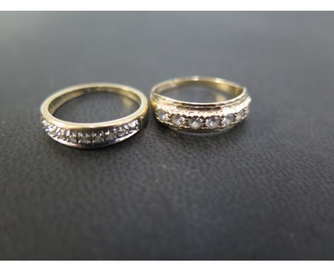 A 9ct gold diamond band ring - Size J 1/2 - Together with a similar white-gem ring - Size K - Both hallmarked Birmingham - To