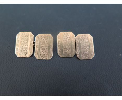 A pair of 9ct gold textured cufflinks - Hallmarked Chester - Panel length 1.6cms - Total weight approx 5.0gms
Condition Repor