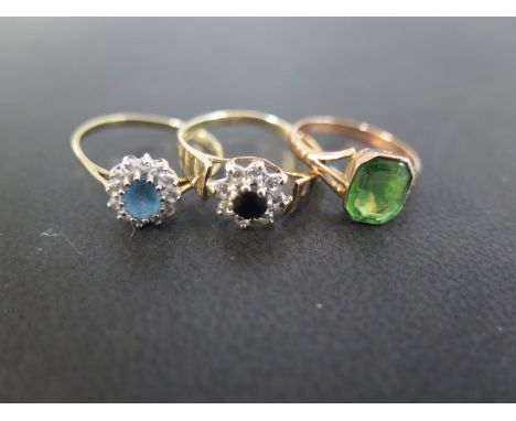 Three gem-set rings - To include sapphire, topaz, cubic zirconia and paste - All with marks indicating 9ct gold - Ring sizes 