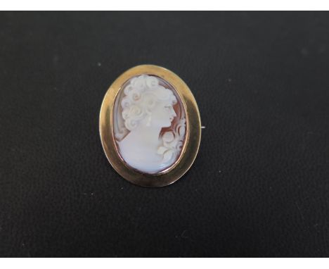 A shell cameo brooch - Within a plain surround - Tests as 9ct gold - Length 3cms - Weight approx 6.2gms
Condition Report: Goo