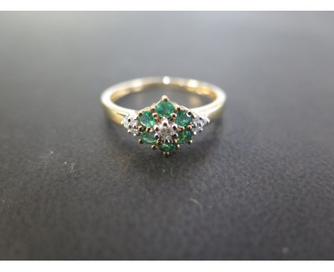 A 9ct gold emerald and diamond cluster ring - Hallmarked Birmingham - Ring size U 1/2 - Weight approx 2.2gms
Condition Report