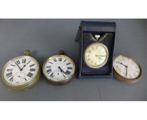 Two oversized white metal cased pocket watches, both with Roman numerals to white enamel dials - both working - a travel cloc
