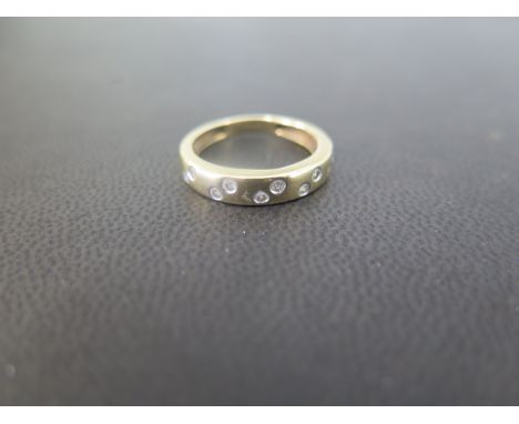 A 9ct gold diamond band ring - Hallmarked Birmingham - Ring size L - Weight approx 2.0gms
Condition Report: Good - With light