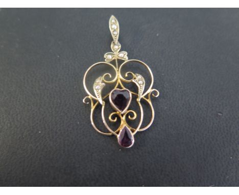 An early 20th century 9ct gold amethyst and seed pearl pendant - Length 4.5cms - Weight approx 2.6gms.
Condition Report: Good