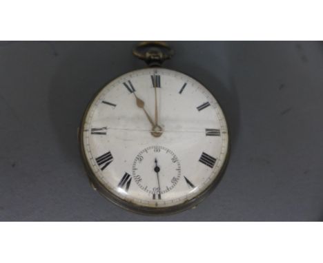 A silver hallmarked open faced pocket watch, Roman numerals to white enamel dial with subsidiary second hand at 6 o'clock - w