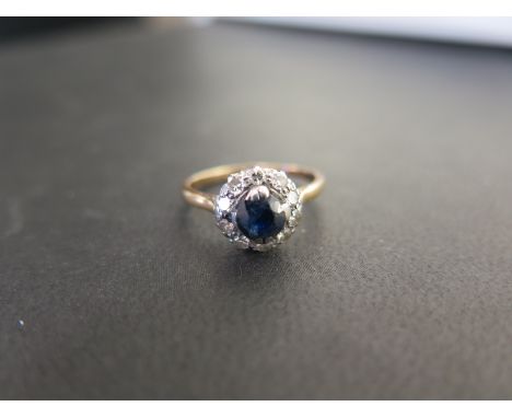 A sapphire and diamond cluster ring - Tests as higher carat gold - Ring size K 1/2 - Weight approx 2.1gms
Condition Report: G