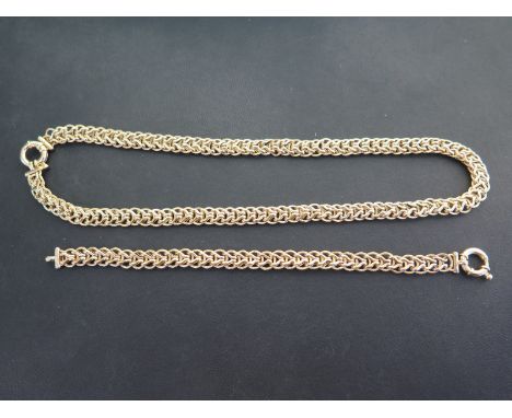 A 9ct gold fancy-link necklace, length 47cms - Together with a matching bracelet, length 20cms - Hallmarked Sheffield - Total