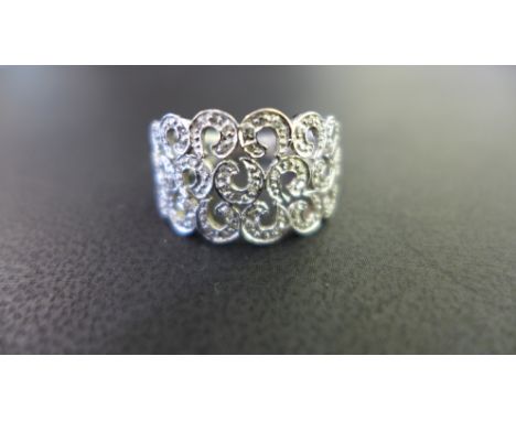 A 9ct gold diamond openwork band ring - Hallmarked Birmingham - Ring size P 1/2 - Weight approx 3.9gms
Condition Report: Good