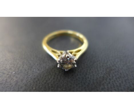 An 18ct yellow gold solitaire diamond ring approx diamond size 0.67ct ring size K - minor scratching, diamond bright