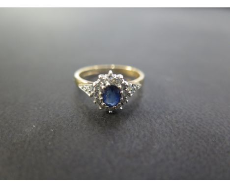 A 9ct gold sapphire and diamond cluster ring - Hallmarked London - Ring size I - Weight approx 2.7gms
Condition Report: Good 