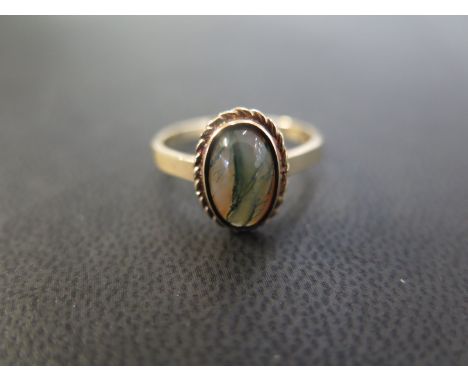 A 9ct gold moss agate single-stone ring - Hallmarked Birmingham - Ring size P - Weight approx 3.1gms
Condition Report: Good