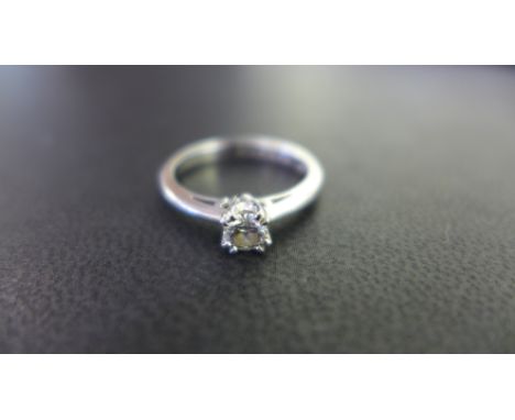 A platinum LEO diamond ring - Accompanied by an IGI report stating the diamond as LEO 048459, 0.25ct, E colour, SI1 clarity -