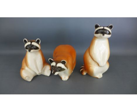 Three Russian ceramic raccoons the tallest being 15cm in height - no damage to items