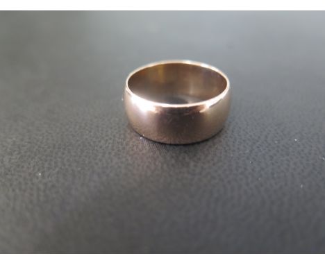 A 9ct gold band ring - Hallmarked London - Ring size R - Weight approx 6.1gms
Condition Report: Good to fair - With light scr