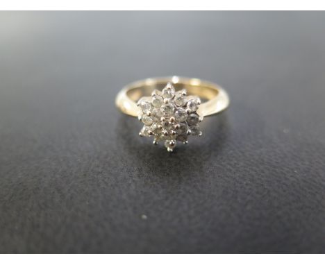 A 9ct gold diamond cluster ring - Hallmarked Birmingham - Ring size N - Weight approx 3.3gms
Condition Report: Good - With li