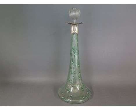 A Loetz glass decanter with green glass highlights to body, hallmarked silver rim to top with stopper, silver hallmarked for 