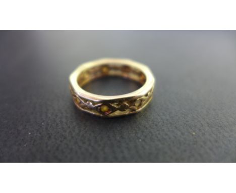 A 9ct gold white-gem full-circle ring - Hallmarked Birmingham - Ring size K 1/2 - Weight approx 2.5gms
Condition Report: Good