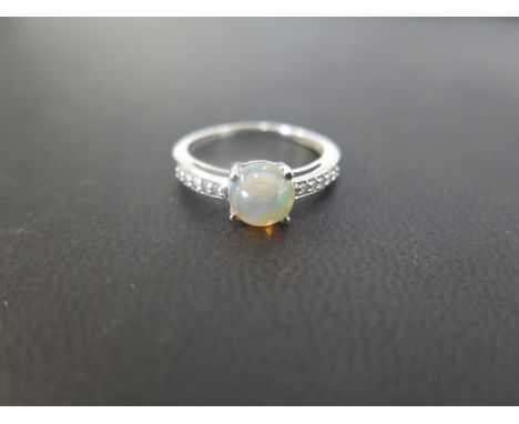 A 9ct gold mystic-gem and diamond dress ring - Hallmarked Birmingham - Ring size O - Weight approx 2.0gms
Condition Report: G