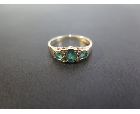 A 9ct gold emerald and diamond dress ring - Hallmarked Birmingham - Ring size L 1/2 - Weight approx 1.9gms
Condition Report: 