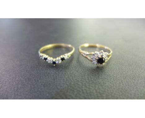 Two 9ct gold sapphire and cubic zirconia rings - Hallmarked Birmingham - Ring size L 1/2 - Weight approx 2.1gms
Condition Rep