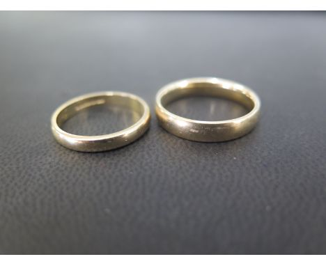 Two 9ct gold band rings - Hallmarked London - Ring sizes M and P 1/2 - Weight approx 5.5gms
Condition Report: Good to fair - 