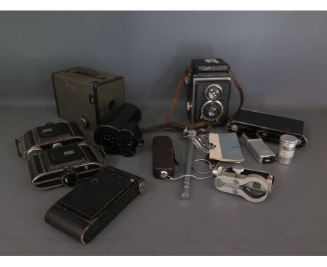 A selection of vintage Film cameras to include a green coloured Kodak Brownie, a 1930's Deco style Kodak 620, a Minox Spy Cam