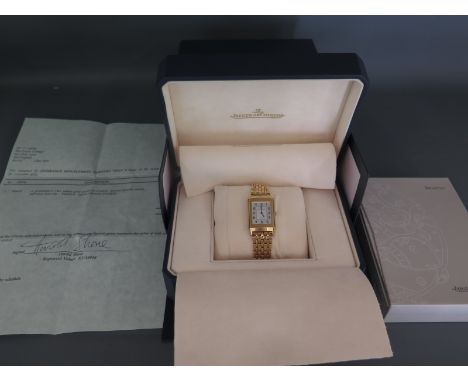 A gentleman's 18ct yellow gold Jaeger Le-Coultre Reverso Classique bracelet watch, movement no. 250.1.86 model 1941014, the w