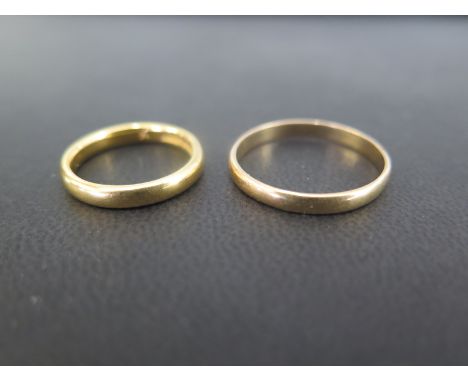 Two 22ct gold band rings - Hallmarked Birmingham - Ring sizes K 1/2 and U - Total weight approx 7.2gms
Condition Report: Good