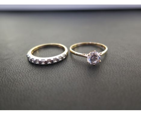 Two 14ct gold cubic zirconia rings - To include a single-stone and a half-circle ring - Hallmarked London - Ring sizes T - We