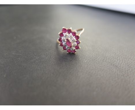 A 9ct gold ruby and diamond marquise-shape cluster ring - Hallmarked London - Ring size M - Weight approx 2.0gms
Condition Re