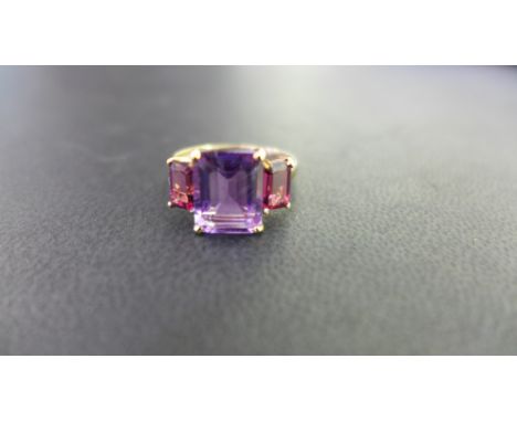 A 9ct gold amethyst three-stone ring - Hallmarked Birmingham - Ring size P 1/2 - Weight approx 2.3gms
Condition Report: Good