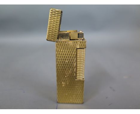 A gold plated Dunhill lighter - some wear to plating and general usage wear