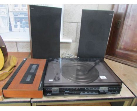 A Bang & Olufsen Beocord 1100 tape deck, Beocentre 1800 record player and pair of Beovox P30 speakers.
