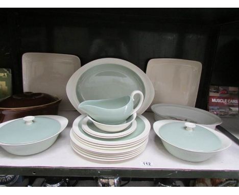 A shelf of Wedgwood dinner ware etc.,