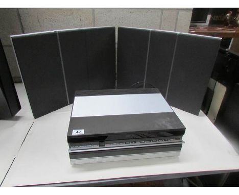 A Bang & Olufsen Beocord 5000 cassette deck, Beomaster 5000 tuner/amplifier and 6514 speakers.