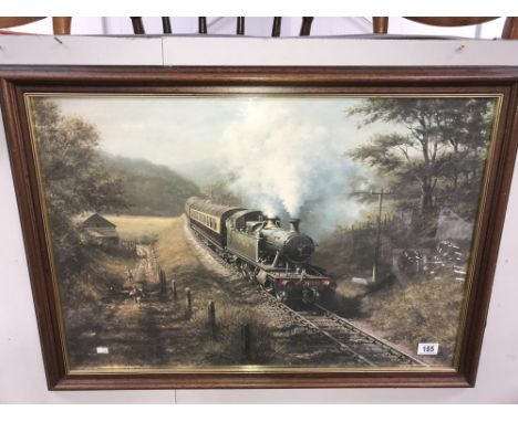 A framed and glazed print of a steam locomotive.