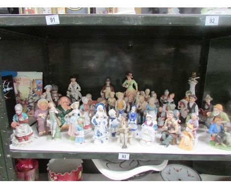 A large collection of assorted figures (one shelf).