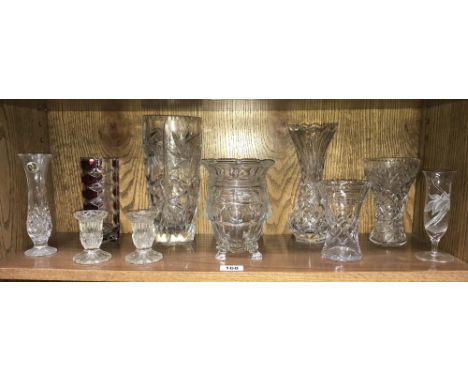 A shelf of assorted glassware.