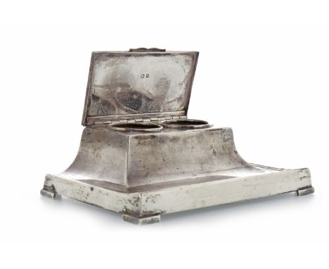 GEORGE V SILVER DOUBLE INKWELLmaker Adie Brothers, Birmingham 1926, of shaped, rectangular form, raised on four bracket feet,
