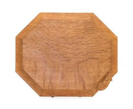 Workshop of Robert Mouseman Thompson (Kilburn): An English Oak Bread Board, of octagonal form, with carved mouse trademark,30