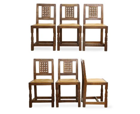 Workshop of Robert Mouseman Thompson (Kilburn): A Set of Six English Oak Lattice Back Dining Chairs, 1990, tan leather seats,