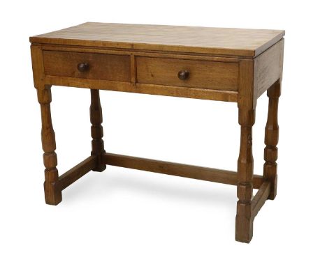 Workshop of Robert Mouseman Thompson (Kilburn): An English Oak Hall Table, the adzed rectangular top above two drawers with t