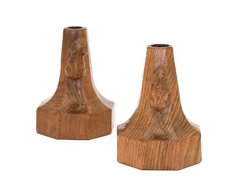 Robert Mouseman Thompson (1876-1955): A Pair of English Oak Candlesticks, of octagonal form, each with carved mouse trademark