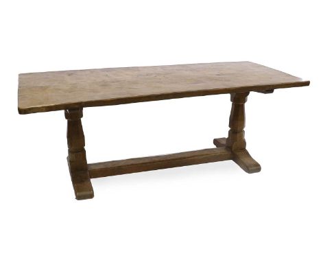 Robert Mouseman Thompson (1876-1955): An English Oak 6'6" Refectory Dining Table, 1933, dowelled adzed two plank top, on two 